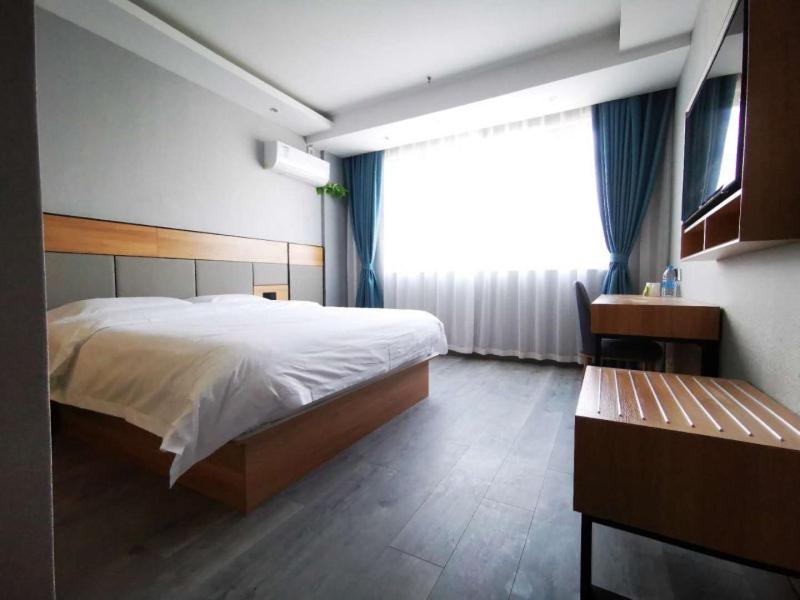 Greentree Inn Shanghai Songjiang University City New Songjiang Road Express Hotel Экстерьер фото